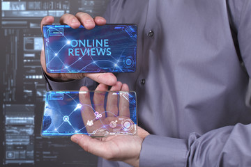 Business, Technology, Internet and network concept. Young businessman working on a virtual screen of the future and sees the inscription: Online reviews