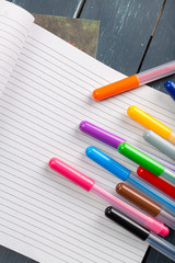 clean sheets on table with markers