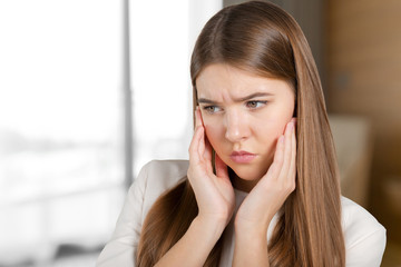 Young woman feeling stressed