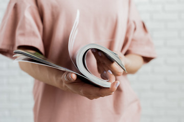 woman reading a magazine