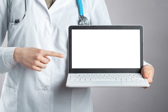 Hands of medical doctor woman with laptop