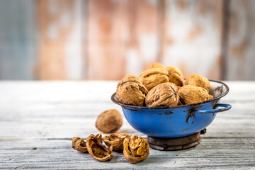   Walnuts on wooden table