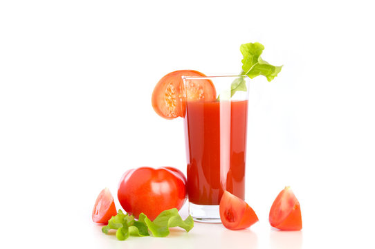 Tomato juice, fresh tomatoes on the white background