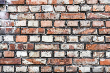 Colorful irregular brick wall texture or background.