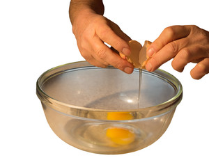 Breaking egg into bowl