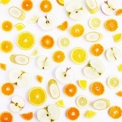 Food pattern of fresh fruit in a cut. Oranges, lemons, bananas, tangerines.