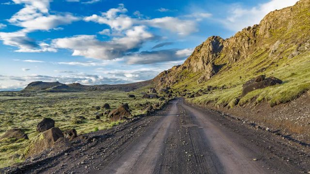 Moss-covered lava fields and track time lapse in Iceland