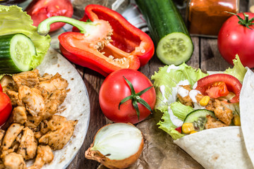 Healthy tortilla with chicken and vegetables, homemade cooking recipe