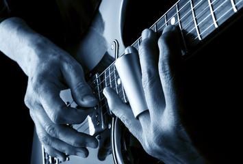 playing slide blues guitar