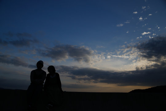 young attractive couple silhouette