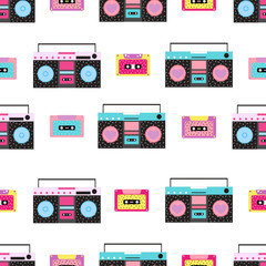 Seamless pattern with cassette tape and boombox.