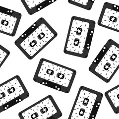 Seamless pattern with black and white cassette tape.