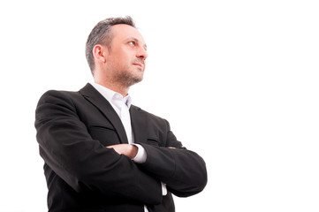 Confident man in formalwear keeping his arms crossed