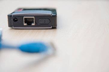 the router and cable plug connector lan cable technology concept .
