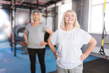Fototapeta premium Happy elderly woman exercising