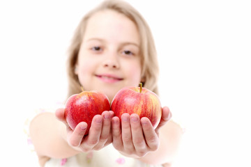 Fototapeta na wymiar child or little girl eating apple isolated on white background