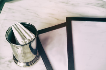 blank menu with paper napkin