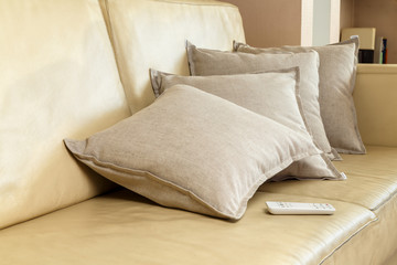 pillows spread out on the sofa