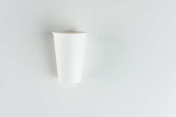 top view of plastic disposable cup isolated on grey