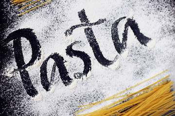 The inscription on the flour. Paste. Black background