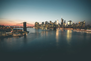 Fototapeta na wymiar Evening Gloom around Brooklyn Bridge and Manhattan - New York