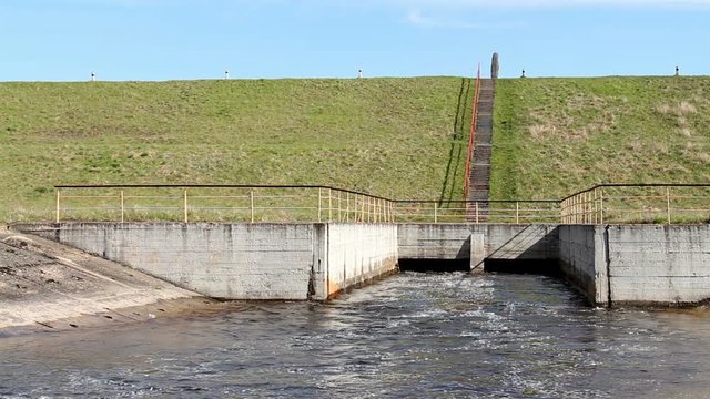 Water flowing over floodgates