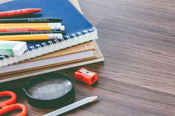 School supplies on wooden table
