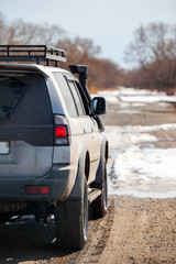 Obraz na płótnie Canvas Cross country vehicle on dirt road