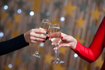 Celebration. People holding glasses of champagne making a toast