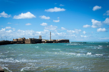 Obraz premium Castle of San Sebastian in Cadiz on a sunny day in March 2017, Andalusia, Spain
