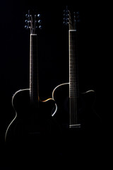 Black guitars in the dark