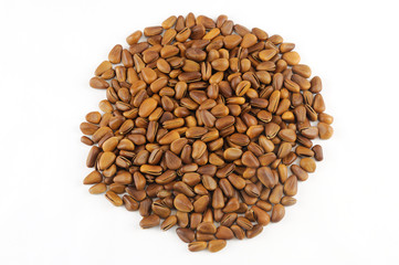 fresh pine nuts isolated on white background