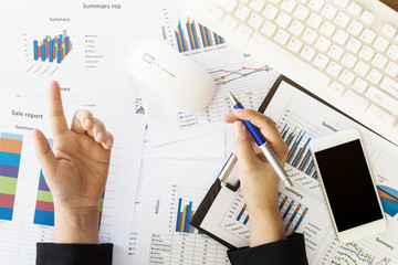 Business woman working at office with documents