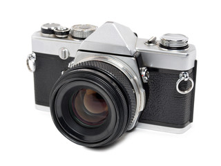 Old film camera on white background