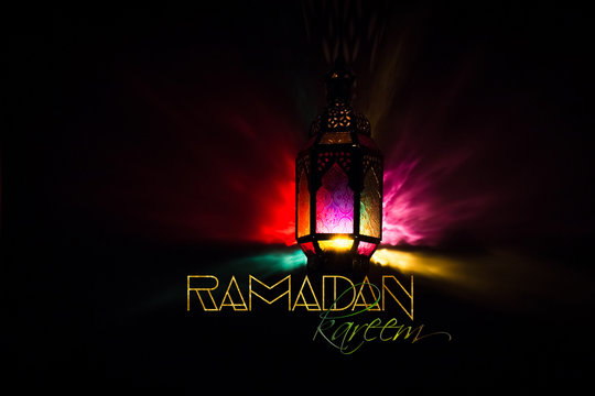 Eid Mubarak Ramadan Kareem greeting - islamic muslim holiday background with eid lantern or lamp