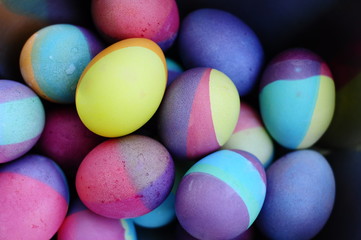 Fototapeta na wymiar Colorful Easter eggs background. Purple egg.