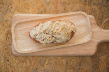 Obraz na płótnie Canvas Bun of bread with mayonnaise and pork floss