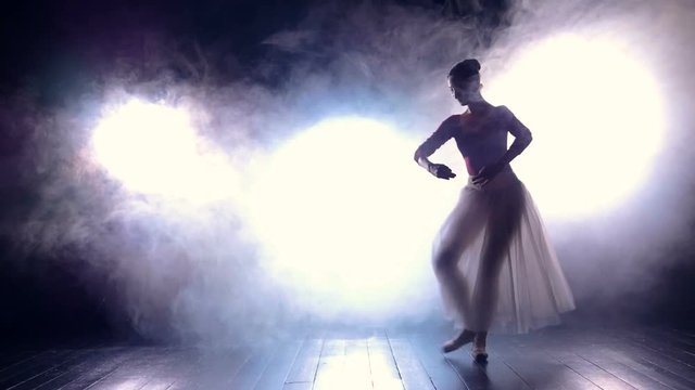 Silhouette of the dancing ballerina. Slowmotion. HD.