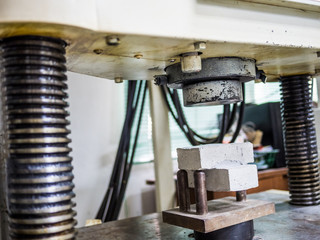 physical testing machine in engineering laboratory