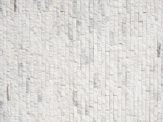 white brick arranged in pattern on the wall