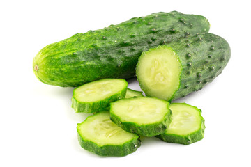 Cucumber and slices isolated on white background, close-up view