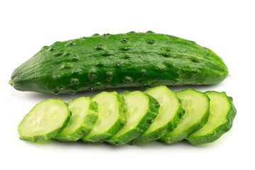Cucumber and slices isolated on white background, close-up view