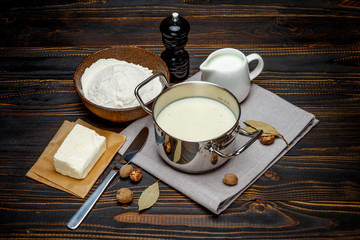 bechamel sauce in a pan and ingredients