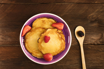 Homemade pancakes with fresh fruit and copyspace