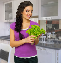 Young woman at kitchen