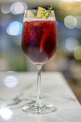 Red wine and apple juice on bokeh background