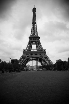 Black and white picture of the Eiffel Tower in Paris, France.
