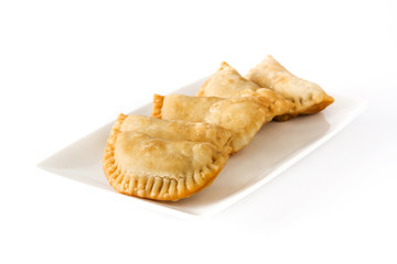 Typical Spanish empanadas isolated on white background

