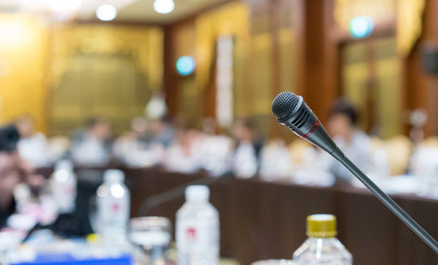 Microphone voice speaker in seminar classroom, lecture hall or conference meeting in educational...