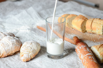 Still life of milk and bread products.